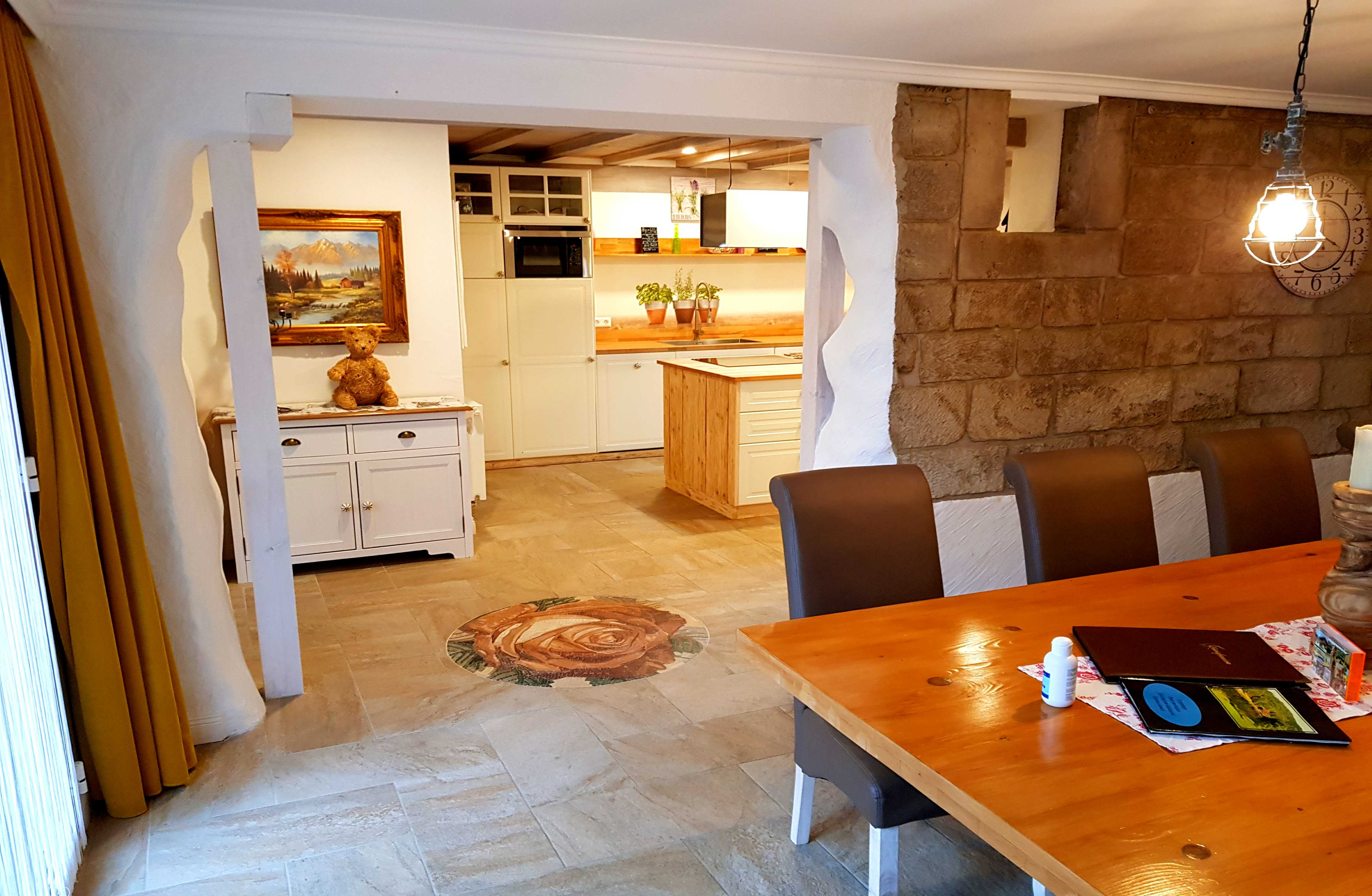 Eifel-Cottage-Dining-Table-with-kitchen